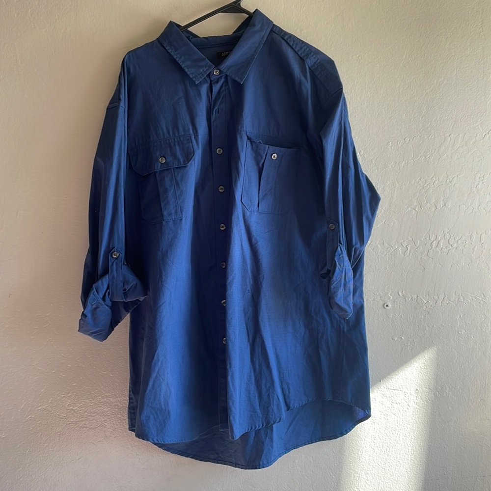 Nice blue dress shirt.